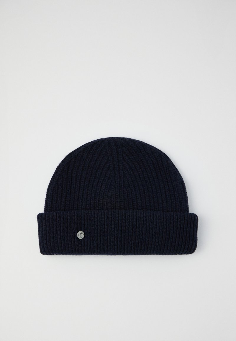 Σκούφος πλεκτός ναυτικού στιλ με ραβδωτή υφή και διπλωμένο χείλος, με μικρή στρογγυλή λεπτομέρεια λογότυπου στο πλάι.