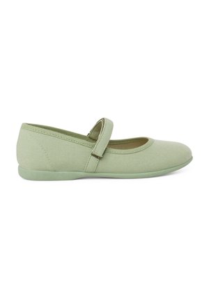 Green canvas Mary Jane shoe with a round toe and elastic strap, featuring a smooth texture and flat rubber sole.