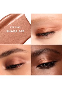 Tinta occhi color rame scintillante etichettata Shade 69S applicata sugli occhi chiusi di tre modelle con tonalità di pelle diverse.