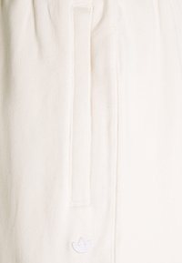 adidas Originals Kalhoty - off-white