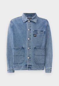 Light blue denim jacket with a classic collar, front buttons, two large front pockets, and a small chest pocket featuring a brand logo.