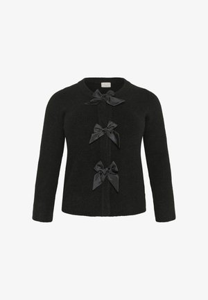 Schwarze Strickjacke mit rundem Ausschnitt, die vorne mit drei Stoffschleifen als Verschlüsse versehen ist. Lange Ärmel, weiche Textur.