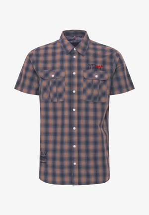 Lühikese varrukaga ruuduline särk tumesinise ja oranži värviga, kahte esist taskut, nööbist sulgemist ja broderitud logo detaili vasakul rinnal.