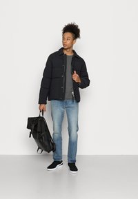 ARKET Casaco de inverno - black