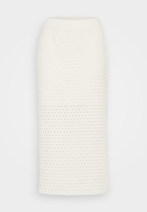 Vit knälång kjol i texturerad tyg med ett perforerat mönster. Rak form, med resårmidja för bra passform.
