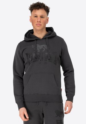Dark gray hoodie made of cotton blend, featuring a kangaroo pocket, ribbed cuffs, and a large embossed lion graphic on the front.