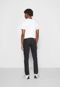 Levi's® Skateboarding SKATE 511 SLIM 5 POCKET - Kavbojke slim fit - caviar bull denim