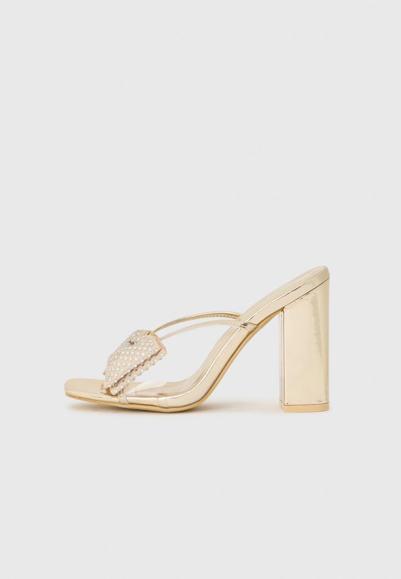 Koi Footwear Muiltjes met hak goudkleurig