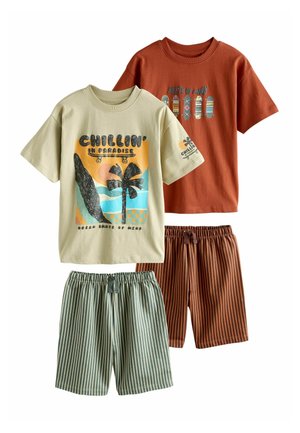 Two sets of kids' outfits with graphic t-shirts and striped elastic waist shorts, one beige and green, the other rust orange and brown.