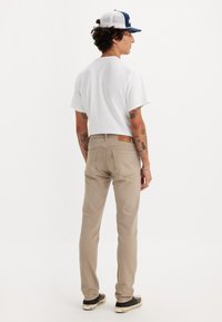 Levi's® 511 SLIM - Jeans straight leg - paper
