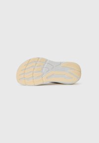 Shoe outsole with a white and gum rubber bottom. Features a textured tread pattern and grooves for traction. Durable and flexible design.