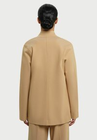 RESIDUS ATIN - Halflange jas - beige