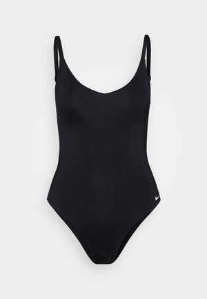 Bañador negro de una sola pieza con escote en V, tirantes delgados y pierna de corte alto. Está hecho de un tejido suave con un pequeño logo en la cadera.