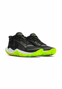 Black athletic shoes with mesh upper, featuring a white midsole and a textured green outsole with red accents. Symmetrical design.