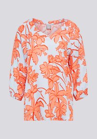Weißes Bluse mit lebhaftem orangefarbenem Blumenmuster, mit rundem Ausschnitt und dreiviertelärmeln mit elastischen Bündchen. Glatte Stoffstruktur.