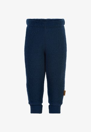 Tumesinine fliisdžoggerid ribitud varrukate ja vöökohaga, tekstuurse kangaga ja väikese pruuni sildiga külgedel.