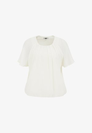 Valge pluus lühikeste, tiibadega varrukatega; volditud detailid ees; pehme tekstuur ja lõdvem aans. Ümar kaelus, nähtavat riistvara pole.