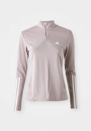 Long-sleeve athletic pullover in light purple fabric with a zippered collar. Features white stripes on sleeves and logo on the chest.