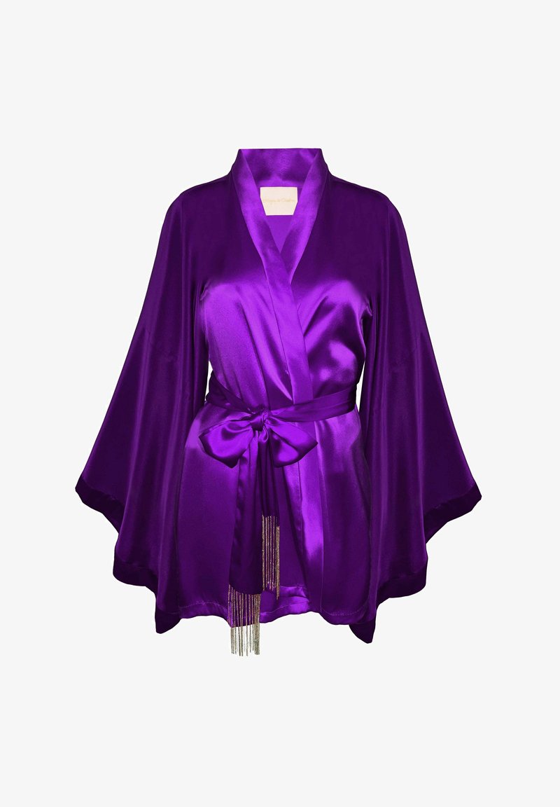 Purple satin robe with wide sleeves, belted waist, and a decorative fringe detail at the hem. Smooth texture, luxurious sheen.