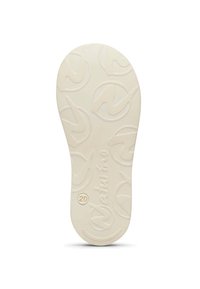 Bílá gumová vložka s texturovaným povrchem, obsahující kruhové vzory a slovo "Nautino" vyražené poblíž paty.