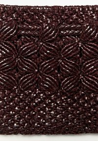 Dark brown woven leather fabric with intricate braided and knotted pattern in a dense, textured grid design.
