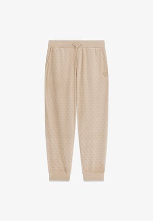 Beige joggingbroek met een all-over logoprint, elastische tailleband en manchetten. Voorzien van twee zijzakken en een driehoekig logodetail.