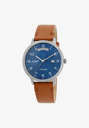 Titanium watch with a blue dial, brown leather strap. Features include silver hour markers, date display, and a day indicator for Thursday.