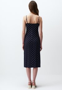 Jimmy Key PATTERNED MIDI WITH STRAPS AND SLITS - Vestito casual - dark blue