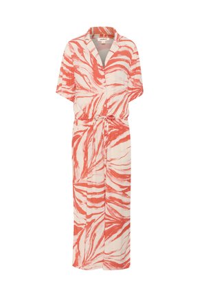 Rdeče-bela vzorčasta kombinezona s kravato, ovratnikom, kratkimi rokavi in pasom. Tkanina se zdi lahka in ima tekoč dizajn.