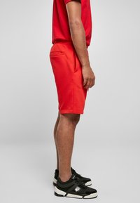 Starter ESSENTIAL - Tepláky - cityred