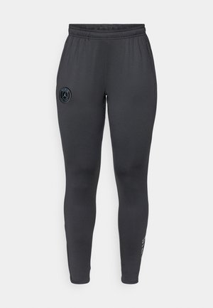 Mørkegrå treningseffekt som har en tettsittende design, laget av et glatt stoff. Inkluderer et brodert logo på øvre lår og elastisk livlinje.