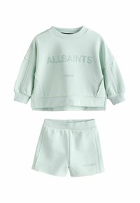 Gai piparmētru zaļš kokvilnas maisījuma sporta krekls ar izspiestu "ALLSAINTS" logo un atbilstošām šortiem; brīvs piegriezums un ribotas piedurknes.