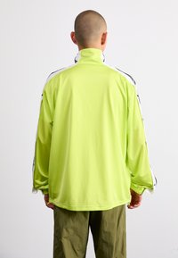 adidas Originals MEGABREAK - Giacca sportiva - bahia glow