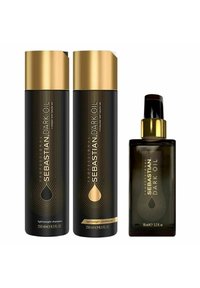 Three black bottles with gold accents: two cylindrical bottles labeled "Sebastian Dark Oil" for shampoo and conditioner, and a smaller oil bottle.