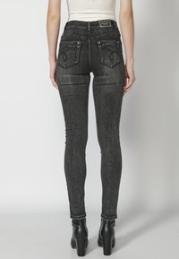 Koroshi LONG  - Vaqueros pitillo - denim black denim