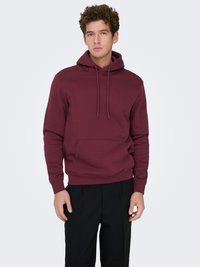 Maroon hoodie made of soft cotton blend, features a front kangaroo pocket, adjustable drawstring hood, and ribbed cuffs for a relaxed fit.