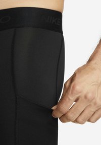 Nike Performance - Kalesony