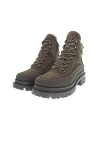 Bruna mockascor hiking boots med faux pälskrage, snörning, förstärkt tå och kraftig gummisula med djup mönstring för bra grepp.