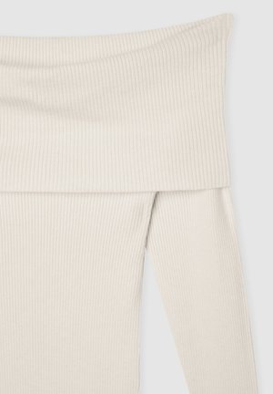 Top aderente a spalle scoperte a coste di colore crema chiaro. Presenta un ampio scollo e maniche lunghe aderenti, mettendo in risalto una texture morbida e un tessuto elastico.