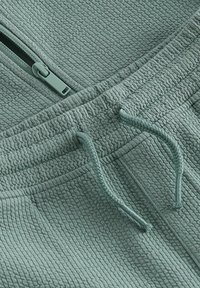 Next ZIP THROUGH SET-REGULAR FIT - Pantalon de survêtement - teal blue