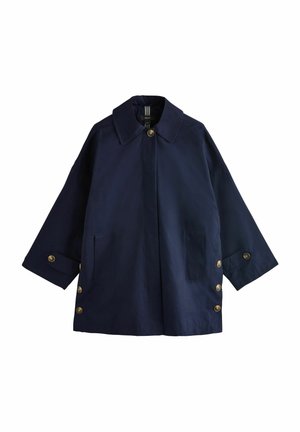 Navy blue waterproof coat with a high collar, gold buttons, side pockets, and a loose fit. Smooth texture with a simple design.