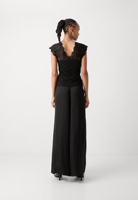 Morgan DELOR - Blūze - noir