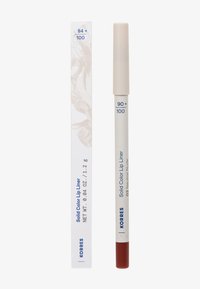 Liner labbra a colore solido Korres nella tonalità 02 Neutral Nude con confezione bianca e beige, peso netto di 1,2g e punta marrone.