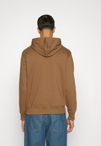 New Balance ESSENTIALS STACKED LOGO HOODIE - Hoodie - dark earth