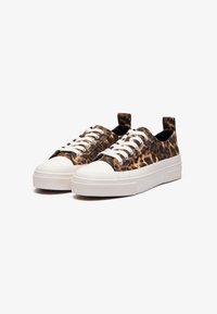 Leopard print canvas sneakers with white rubber soles, featuring white laces and pull tabs for easy wear. Flat, rounded toe design.