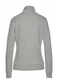 Gray sweatshirt with a high collar, made of soft fabric. Features a snug fit, long sleeves, and embroidered "Bench" logo at the collar.