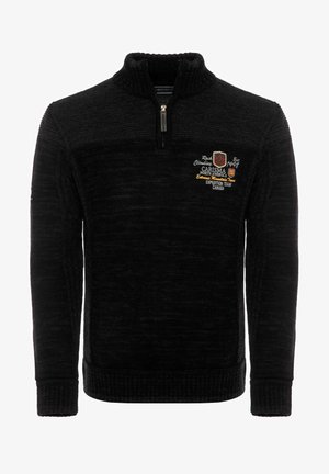 Pullover noir à col haut et zip quart. Tissu texturé avec des logos brodés en jaune et blanc. Poignets et ourlet côtelés.