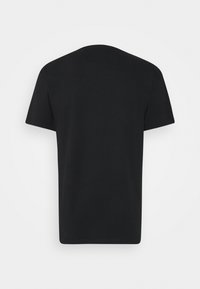 Svart kortärmad T-shirt i mjuk bomull, med klassisk rund halsringning och en enkel design, utan synlig logotyp eller mönster.