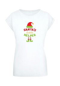 Valge T-särk, millel on kiri "SANTA'S little HELPER" punase ja rohelise tekstiga, kaunistatud punase Jõuluvana mütsi ja väike pühadejalatsite kujutisega rohelises ja punases.