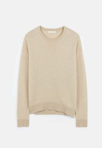 Ljusbeige stickad tröja med rund halsringning, långa ärmar och ribbade muddar. Har en något cropped design och mjuk struktur.